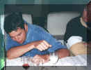 Ramon embarrassed about Andis way to eat.jpg (43198 bytes)